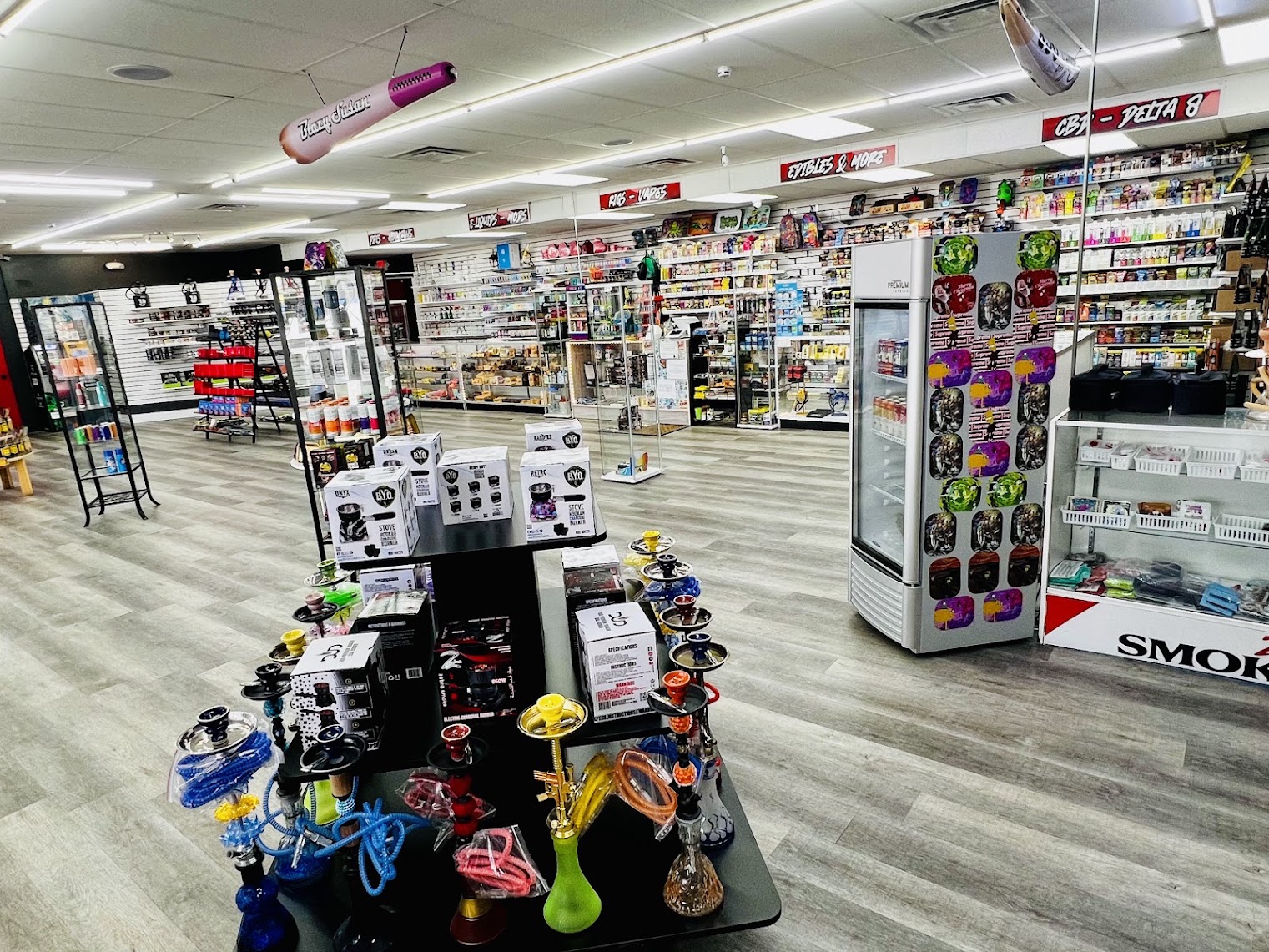 ZAZA Smoke Shop & Vapes Interior — Hookah and Vape Shop Kissimmee Interior of ZAZA Smoke Shop & Vapes in Kissimmee, FL — hookah display and vape shop products
