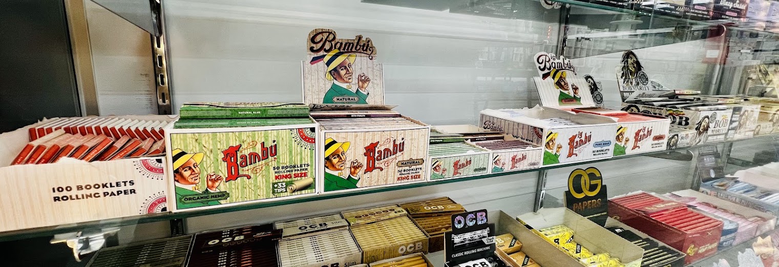 Rolling papers and glass display case at ZAZA Smoke Shop & Vapes, Kissimmee, FL